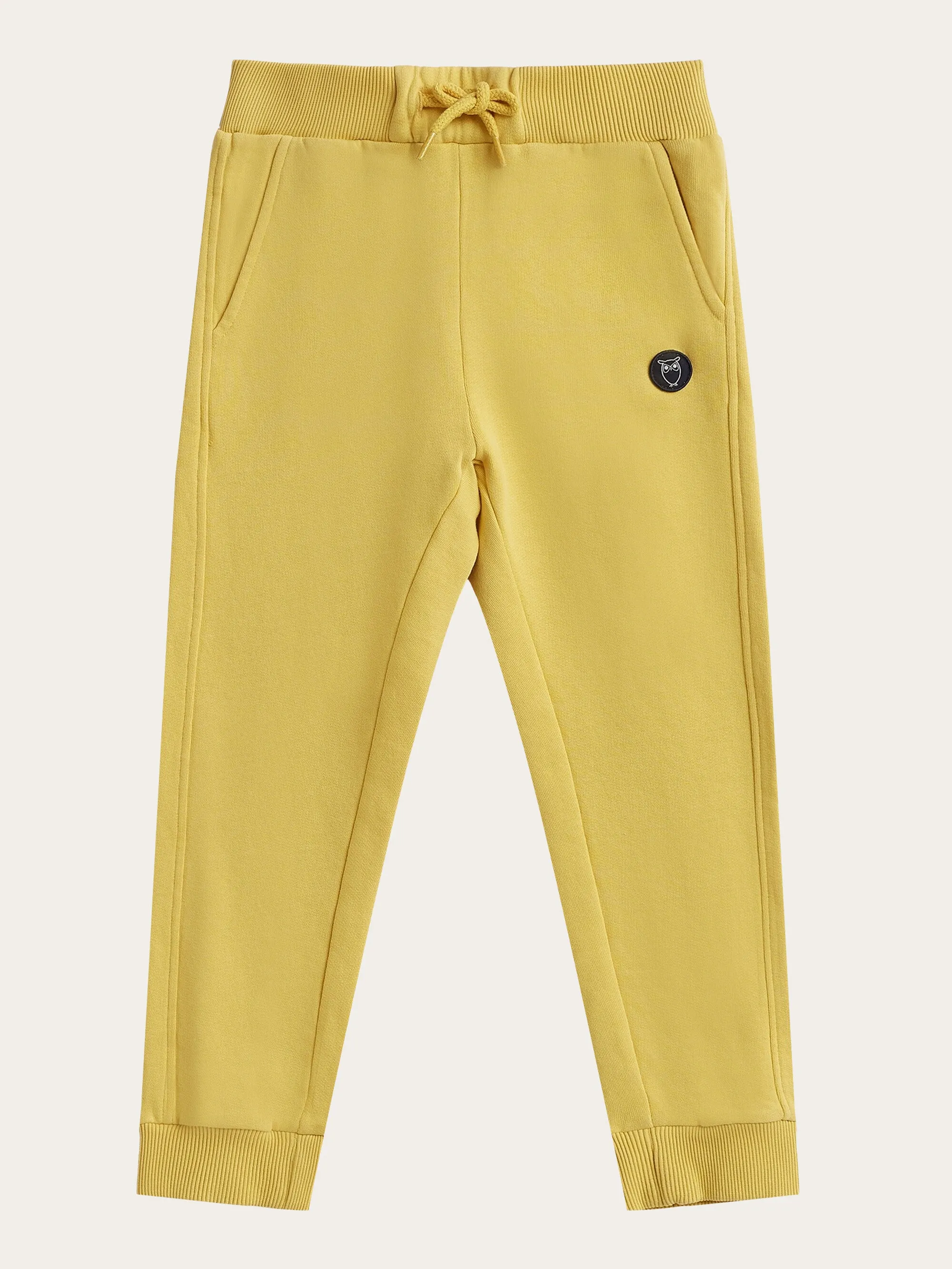 Badge jog pant - Misted Yellow